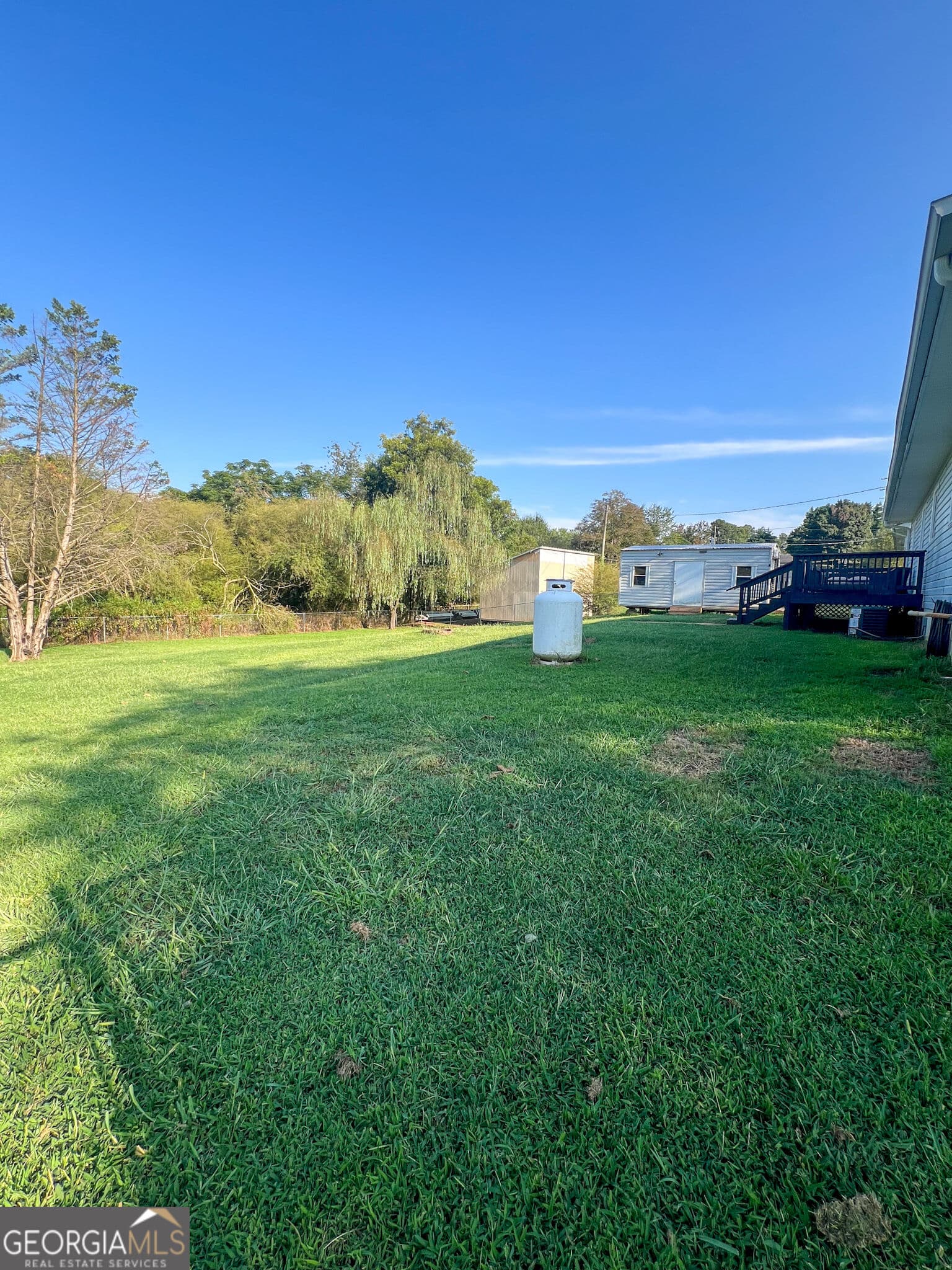 3 bedroom, 2 bathroom, 1,100 sq ft single family residence for sale at 5028 Clarks Bridge Road, Gainesville, GA 30506 — photo 6