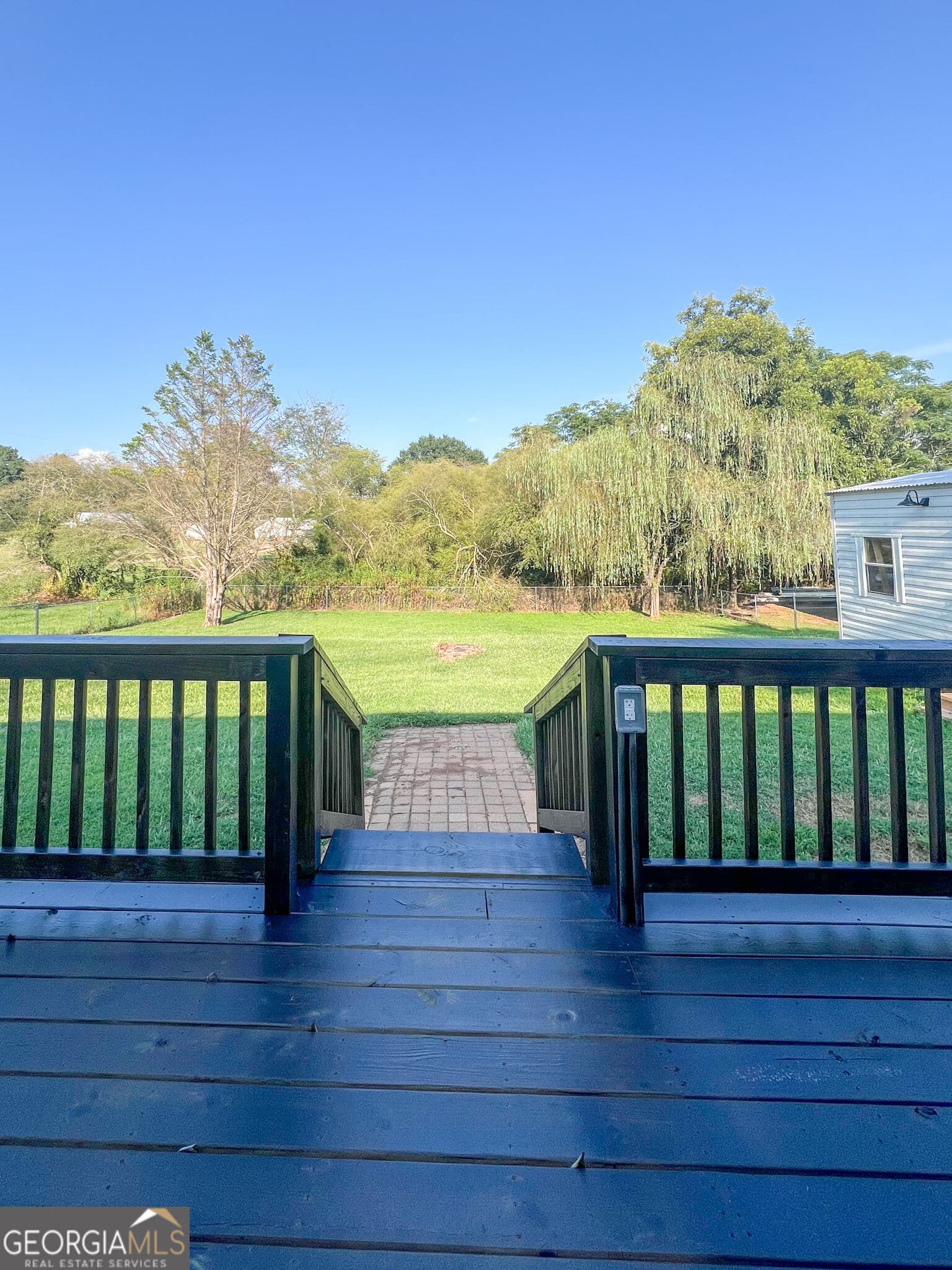 3 bedroom, 2 bathroom, 1,100 sq ft single family residence for sale at 5028 Clarks Bridge Road, Gainesville, GA 30506 — photo 3