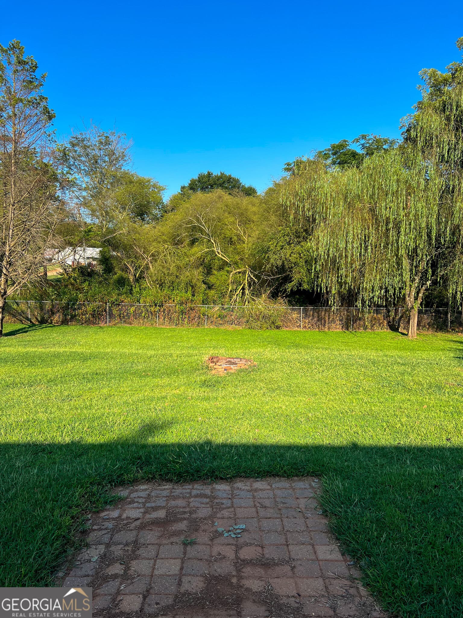 3 bedroom, 2 bathroom, 1,100 sq ft single family residence for sale at 5028 Clarks Bridge Road, Gainesville, GA 30506 — photo 4