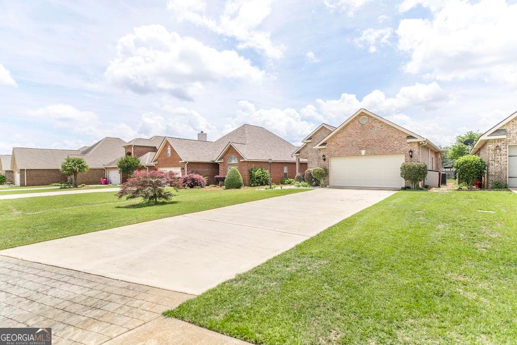 3 bedroom, 2 bathroom, 1,748 sq ft single family residence for sale at 504 Eagle Springs Drive, Centerville, GA 31028 — photo 3