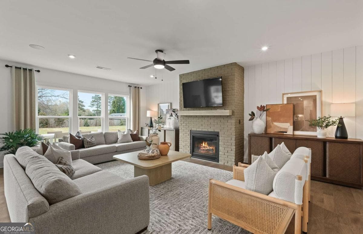 5 bedroom, 3.5 bathroom, 3,554 sq ft single family residence for sale at 7266 Thistle Down Way, Flowery Branch, GA 30542 — photo 6