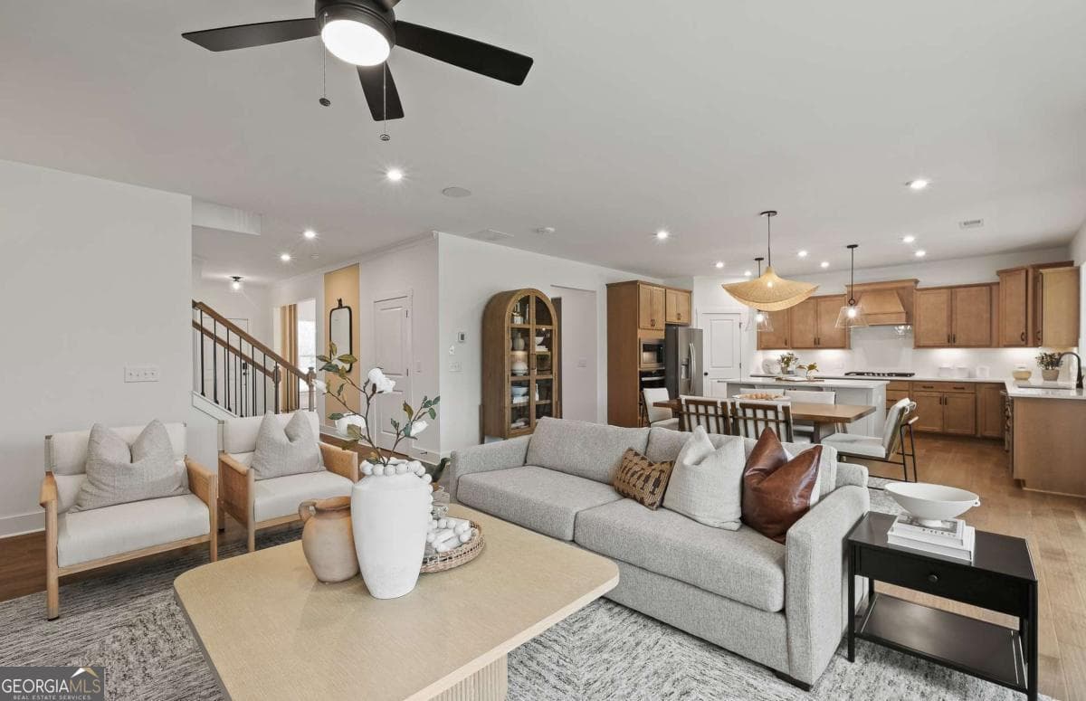 5 bedroom, 3.5 bathroom, 3,554 sq ft single family residence for sale at 7266 Thistle Down Way, Flowery Branch, GA 30542 — photo 5