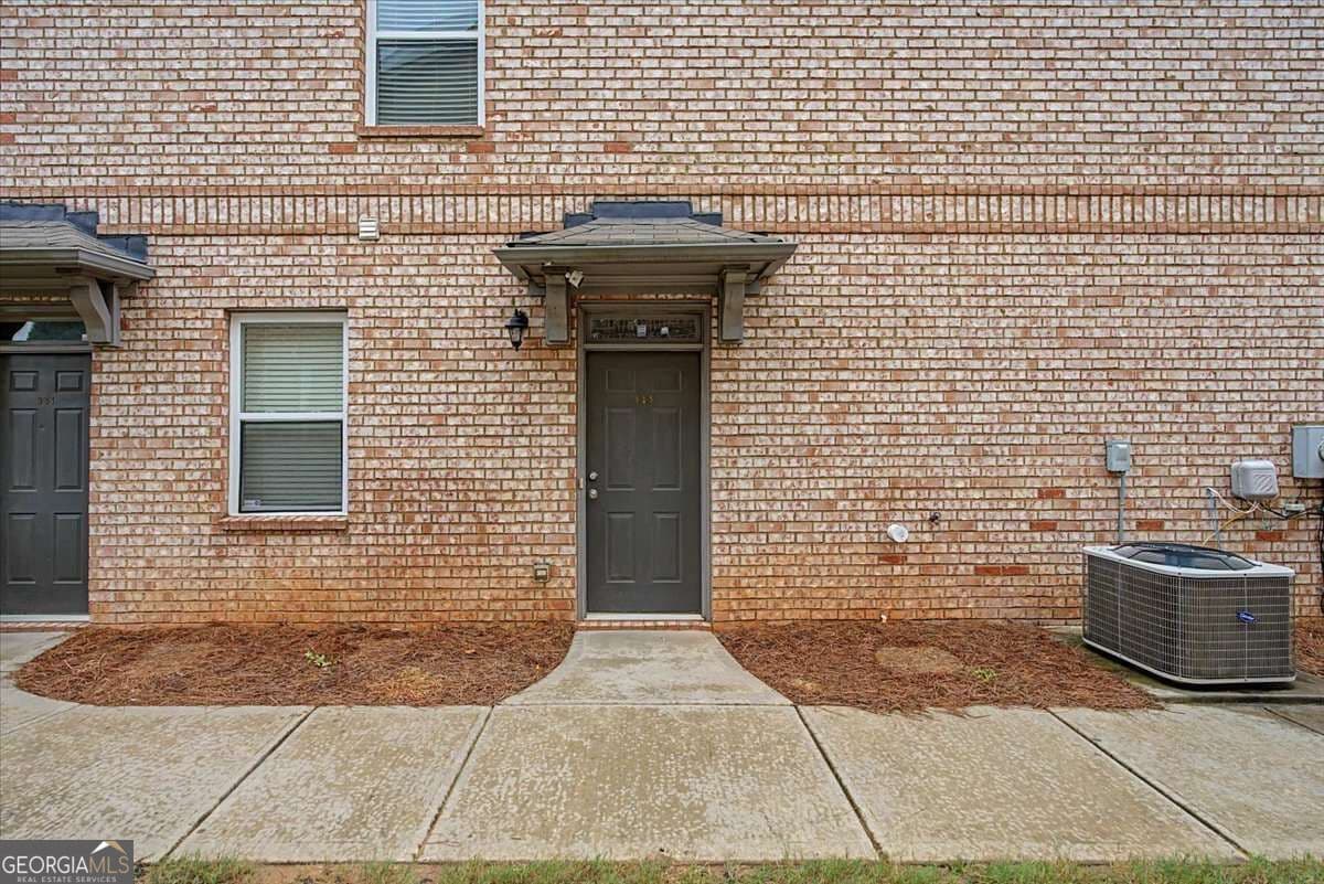 2 bedroom, 2 bathroom, 1,178 sq ft townhouse for sale at 805 Pleasant Hill Road 333, Lilburn, GA 30047 — photo 2
