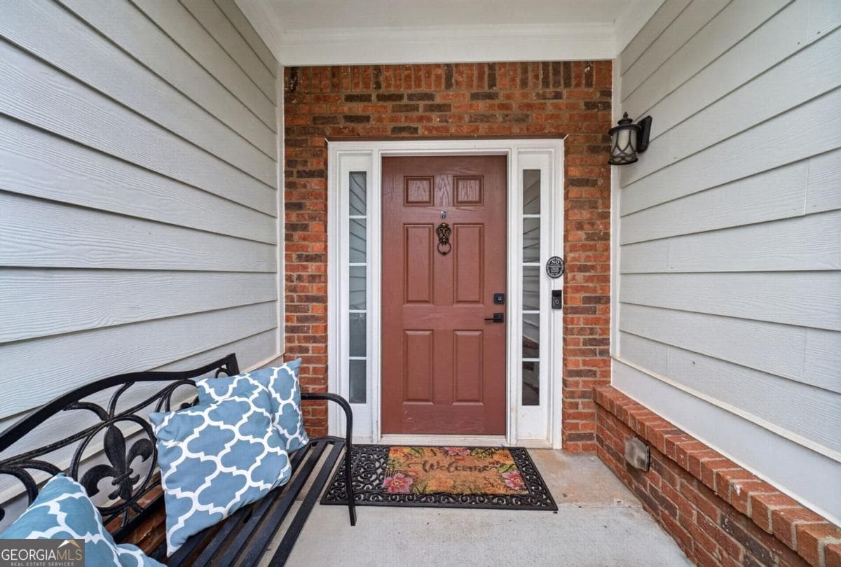 5 bedroom, 2.5 bathroom, 2,768 sq ft single family residence for sale at 6280 Cove Creek Drive, Flowery Branch, GA 30542 — photo 4