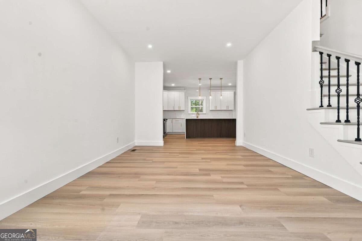5 bedroom, 3 bathroom, 3,100 sq ft single family residence for sale at 746 Mill Rock Street, Lawrenceville, GA 30044 — photo 5