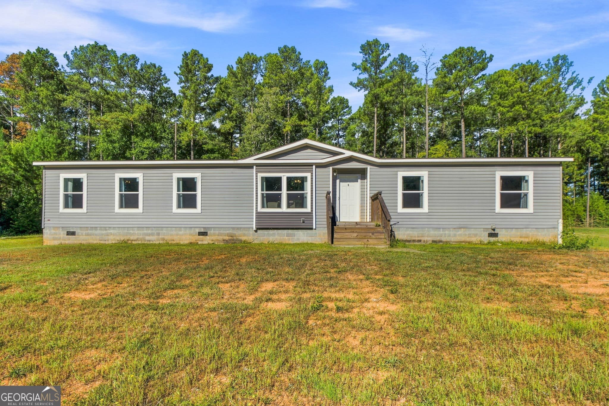 4 bedroom, 2 bathroom, 2,120 sq ft manufactured home,single family residence for sale at 1750 Oakland Road, Gay, GA 30218 — photo 2