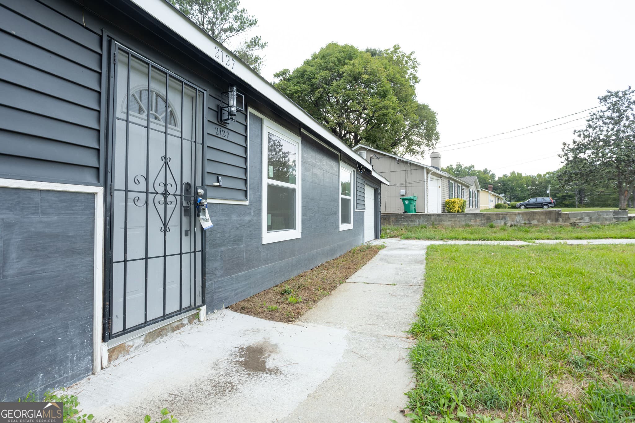 3 bedroom, 2 bathroom, 1,425 sq ft single family residence for sale at 2127 Blue Creek Court, Conley, GA 30288 — photo 2