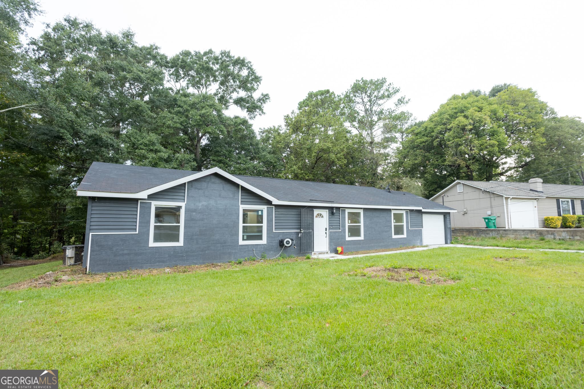 3 bedroom, 2 bathroom, 1,425 sq ft single family residence for sale at 2127 Blue Creek Court, Conley, GA 30288