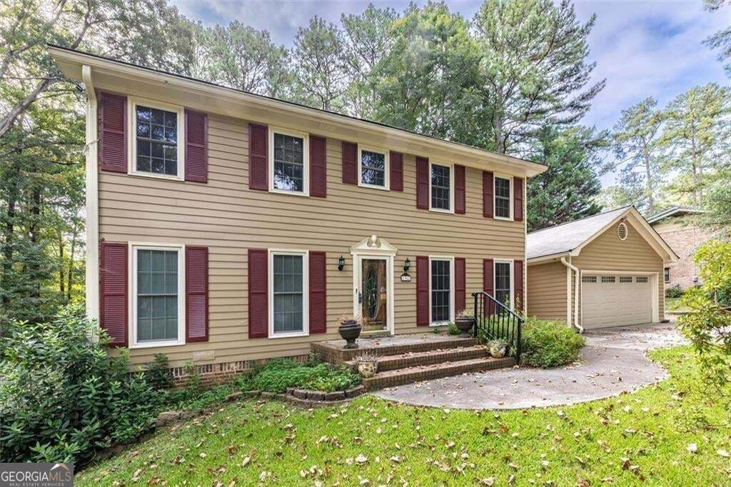 5 bedroom, 3.5 bathroom, 4,724 sq ft single family residence for sale at 1942 Musket Court, Smoke Rise, GA 30087 — photo 2