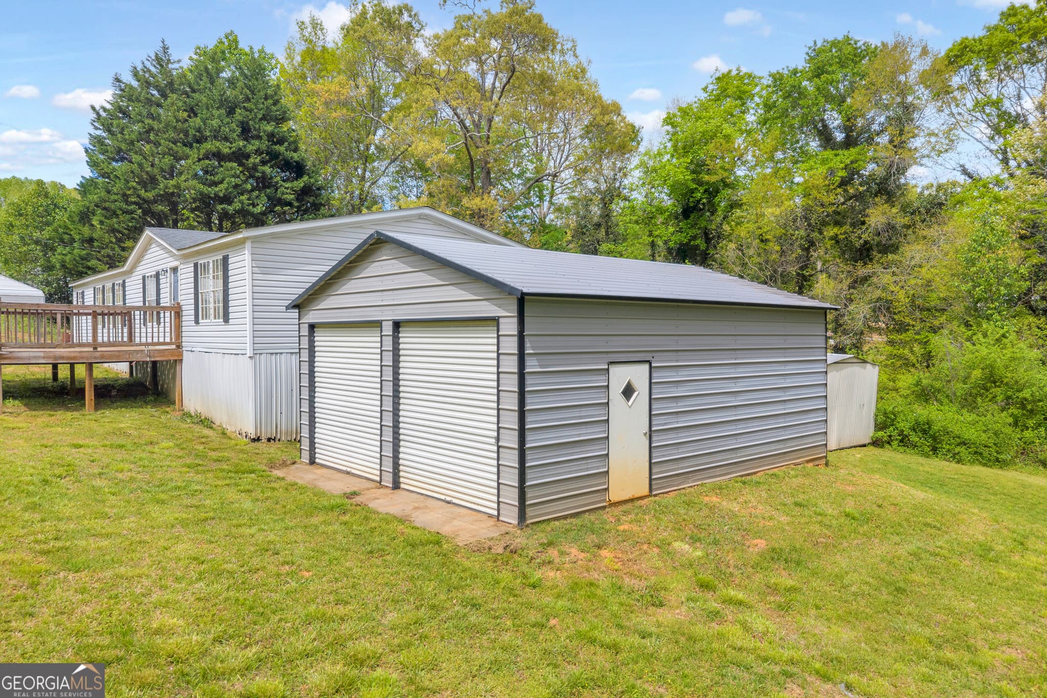 3 bedroom, 2 bathroom, 1,680 sq ft manufactured home,single family residence for sale at 35 Jordan Loop, Toccoa, GA 30577 — photo 3