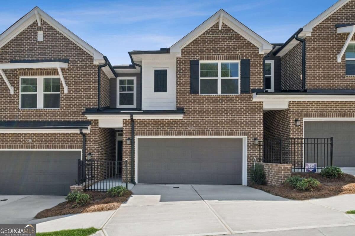 3 bedroom, 2.5 bathroom, 1,910 sq ft townhouse for sale at 202 Redbud Road, Canton, GA 30114 — photo 1 of 22