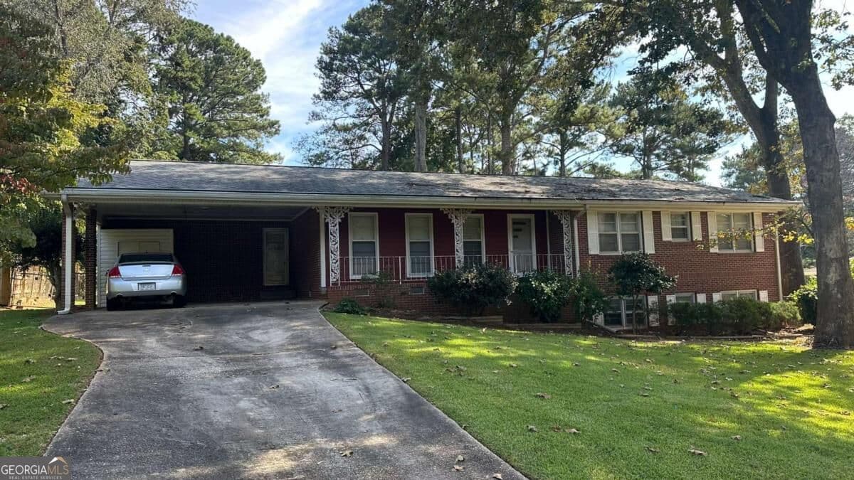 3 bedroom, 2 bathroom, 1,516 sq ft single family residence for sale at 5574 Laurel Lane, Lilburn, GA 30047 — photo 1 of 59