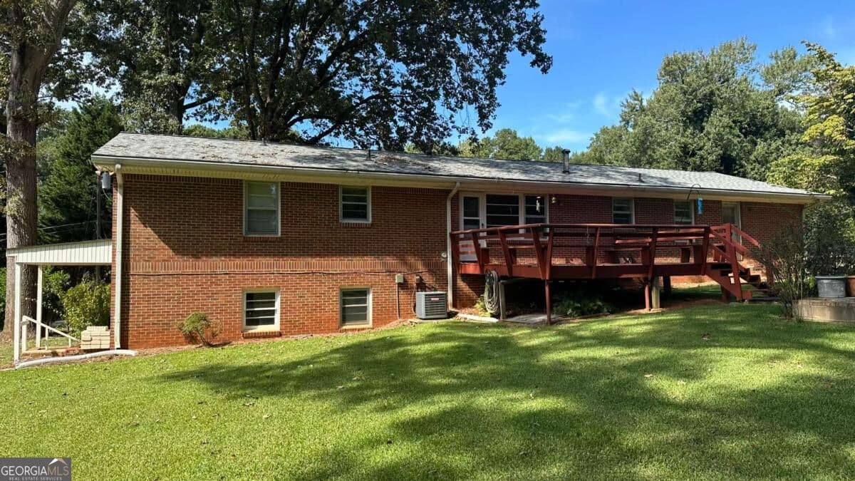 3 bedroom, 2 bathroom, 1,516 sq ft single family residence for sale at 5574 Laurel Lane, Lilburn, GA 30047 — photo 5