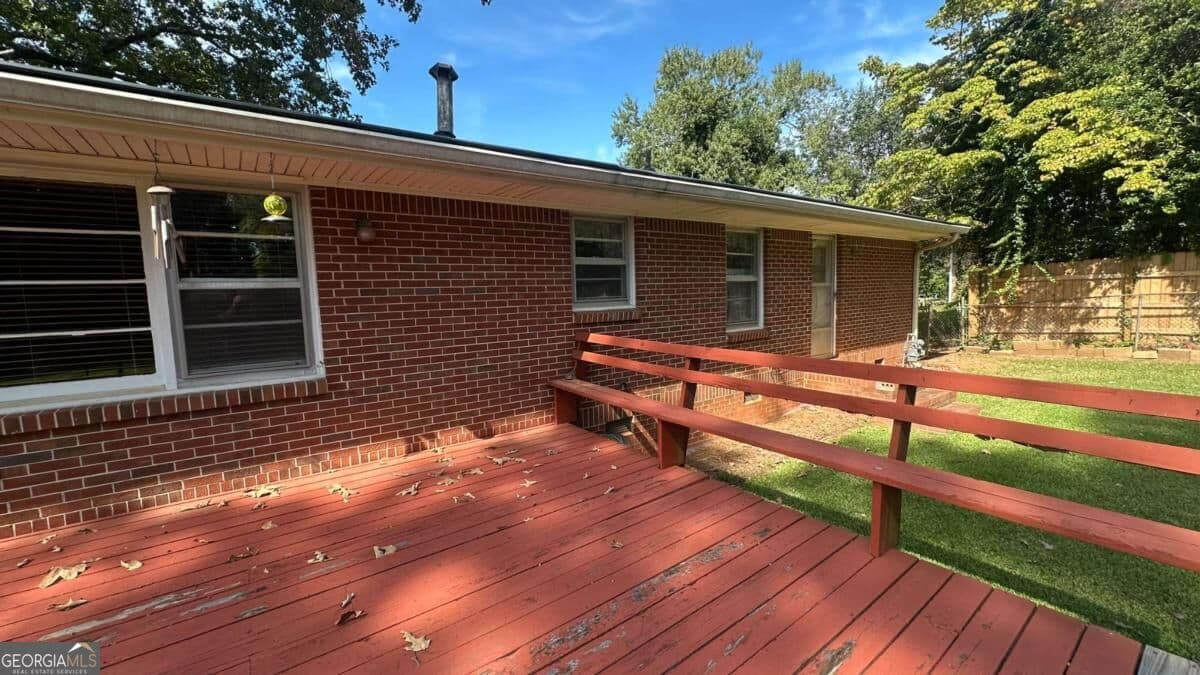 3 bedroom, 2 bathroom, 1,516 sq ft single family residence for sale at 5574 Laurel Lane, Lilburn, GA 30047 — photo 9