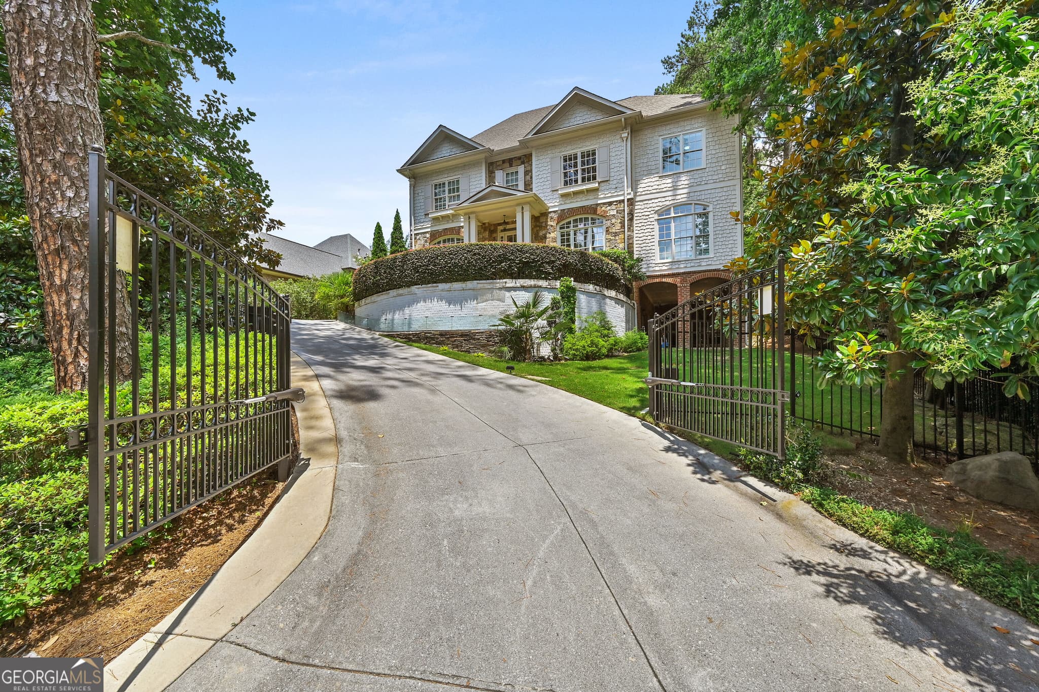 8 bedroom, 7.5 bathroom, 7,619 sq ft single family residence for sale at 982 NE CANTER Road, Atlanta, GA 30324 — photo 2