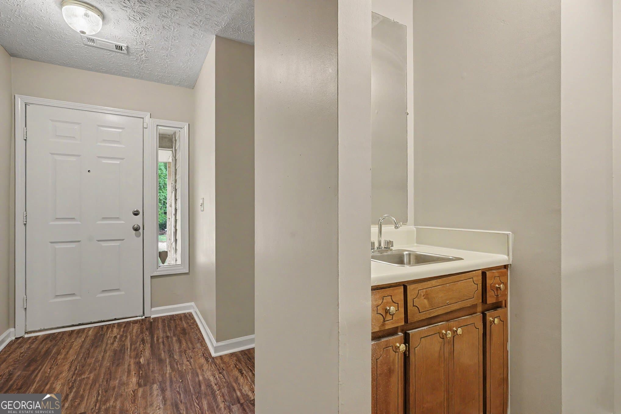 3 bedroom, 2 bathroom, 1,580 sq ft single family residence for sale at 2900 Rosecommons Drive, Hampton, GA 30228 — photo 3