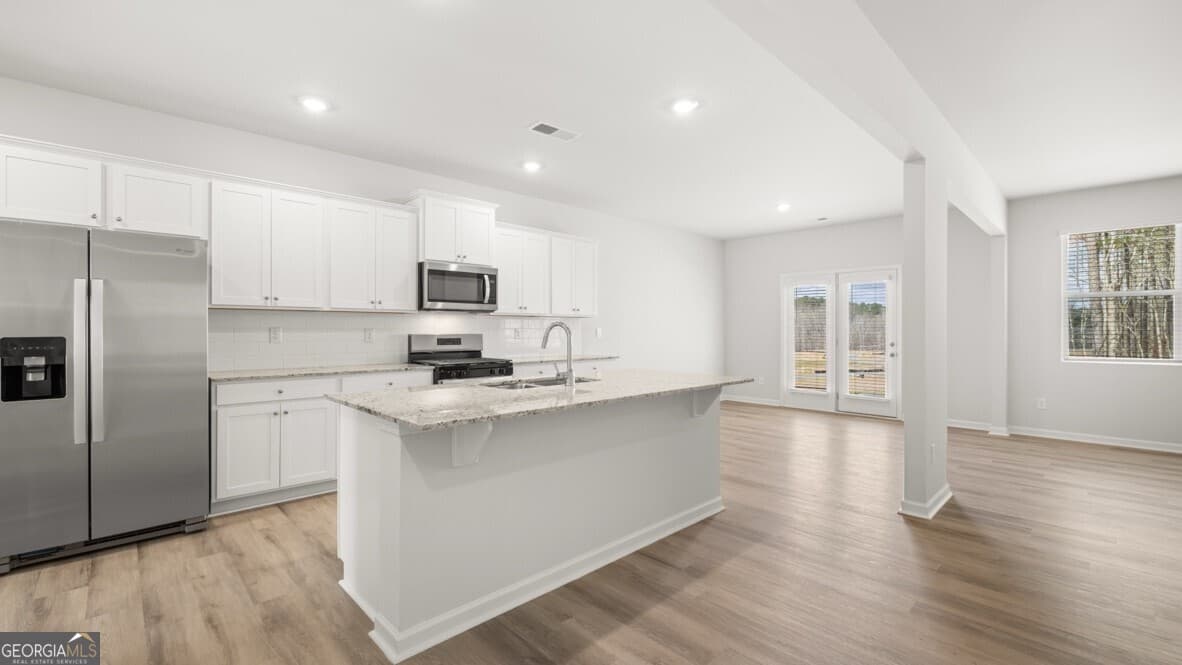 5 bedroom, 3 bathroom, 3,209 sq ft single family residence for sale at 6029 Airedale Drive, Union City, GA 30291 — photo 6