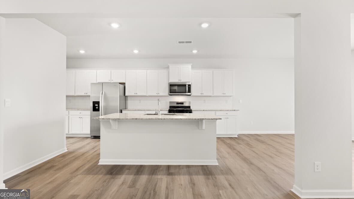 5 bedroom, 3 bathroom, 3,209 sq ft single family residence for sale at 6029 Airedale Drive, Union City, GA 30291 — photo 7