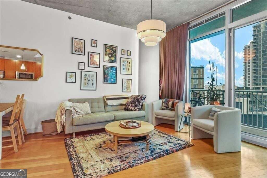1 bedroom, 1 bathroom, 866 sq ft condominium for sale at 44 Peachtree Place 1225, Atlanta, GA 30309 — photo 1 of 32