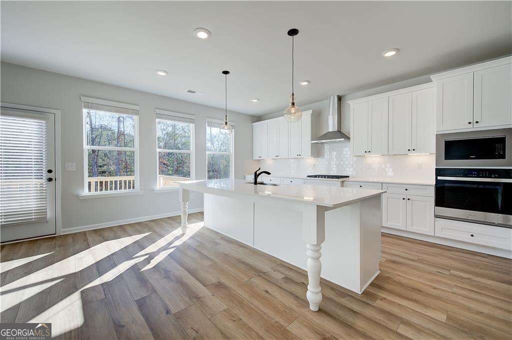 4 bedroom, 3 bathroom, 2,517 sq ft single family residence for sale at 901 Kranston Drive, Locust Grove, GA 30248 — photo 6