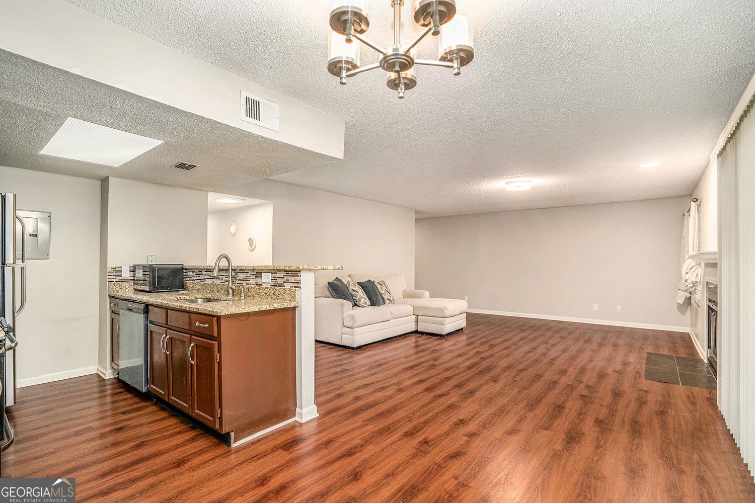 2 bedroom, 2 bathroom, 2,612 sq ft condominium sold at 3053 Westwood Way 7, Alpharetta, GA 30004