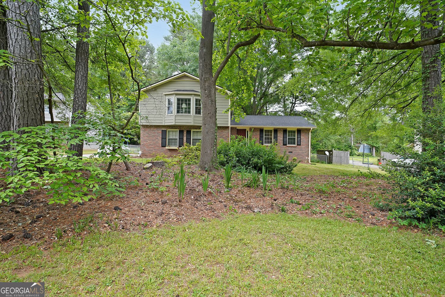 4 bedroom, 2.5 bathroom, 2,076 sq ft single family residence sold at 387 Cascade Drive, Lilburn, GA 30047