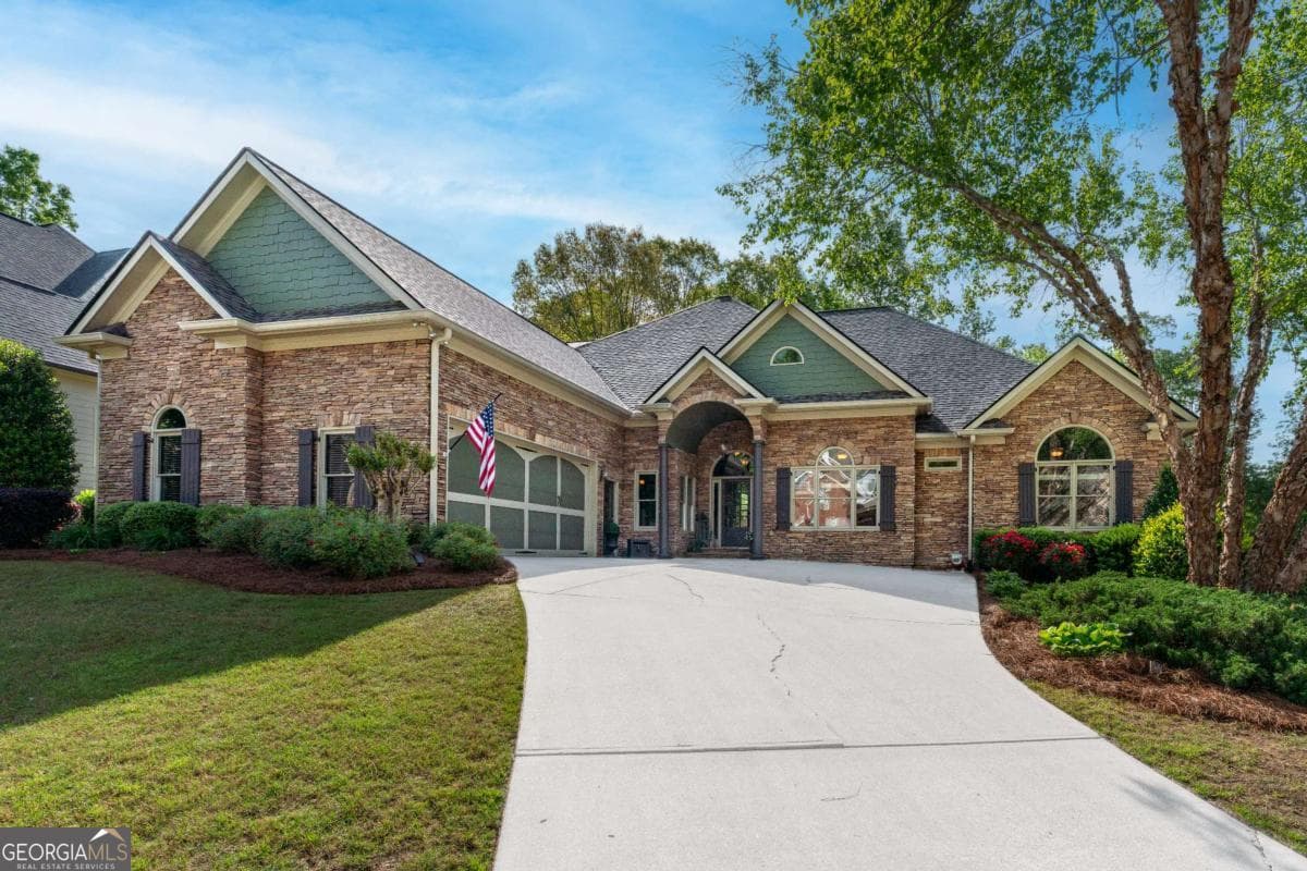 7 bedroom, 4.5 bathroom, 6,472 sq ft single family residence sold at 2111 Democracy Drive, Buford, GA 30519