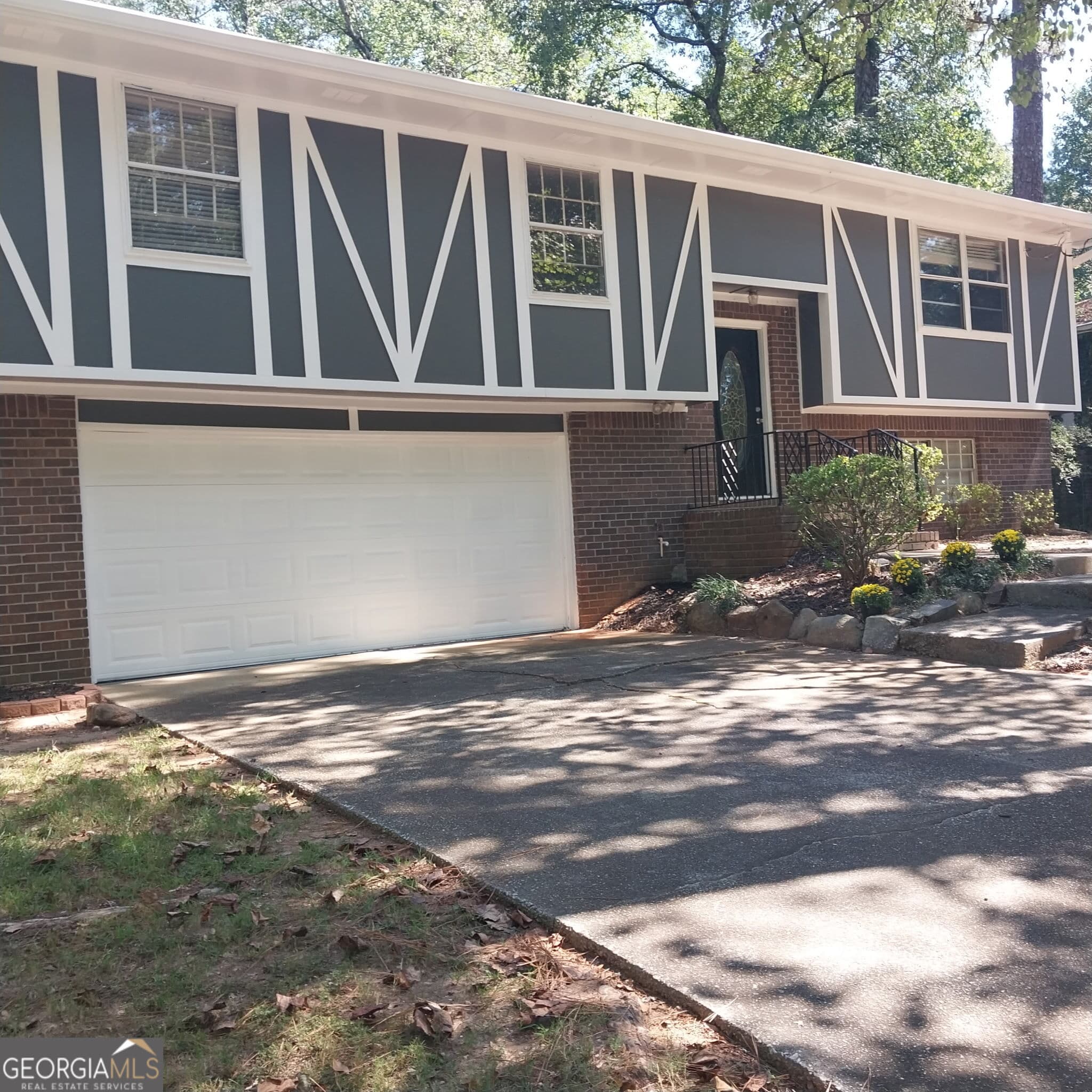 4 bedroom, 2.5 bathroom, 2,460 sq ft single family residence for sale at 401 Pineburr Lane, Stone Mountain, GA 30087