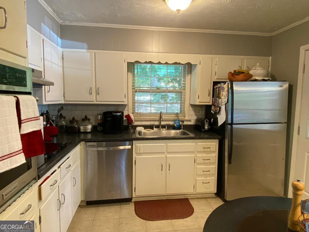 3 bedroom, 2 bathroom, 1,445 sq ft single family residence for sale at 7111 Indian Creek Circle, Covington, GA 30014 — photo 7