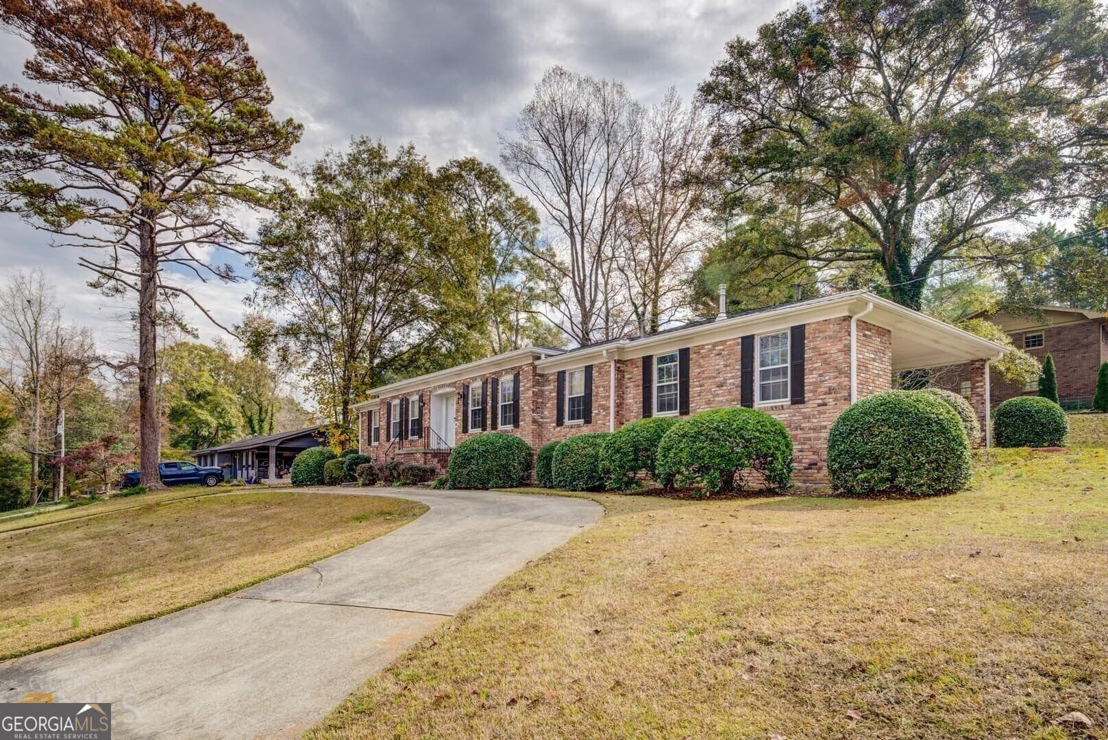 3 bedroom, 2 bathroom, 1,445 sq ft single family residence for sale at 7111 Indian Creek Circle, Covington, GA 30014 — photo 1 of 25