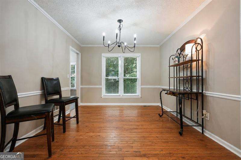 4 bedroom, 3 bathroom, 2,696 sq ft single family residence for sale at 714 Players Court, Woodstock, GA 30189 — photo 6
