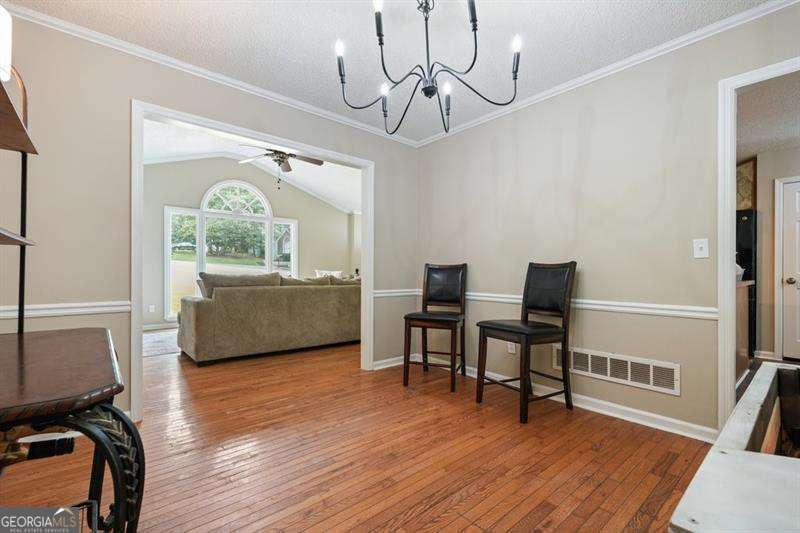 4 bedroom, 3 bathroom, 2,696 sq ft single family residence for sale at 714 Players Court, Woodstock, GA 30189 — photo 7