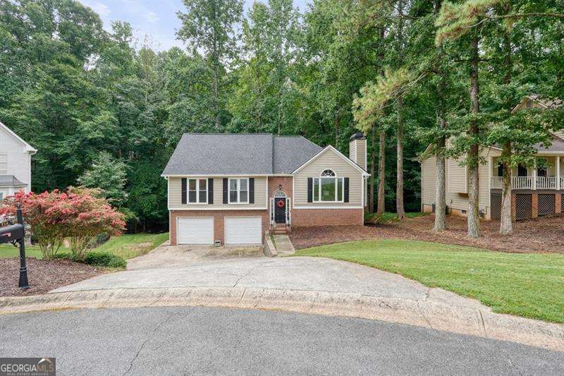 4 bedroom, 3 bathroom, 2,696 sq ft single family residence for sale at 714 Players Court, Woodstock, GA 30189 — photo 4