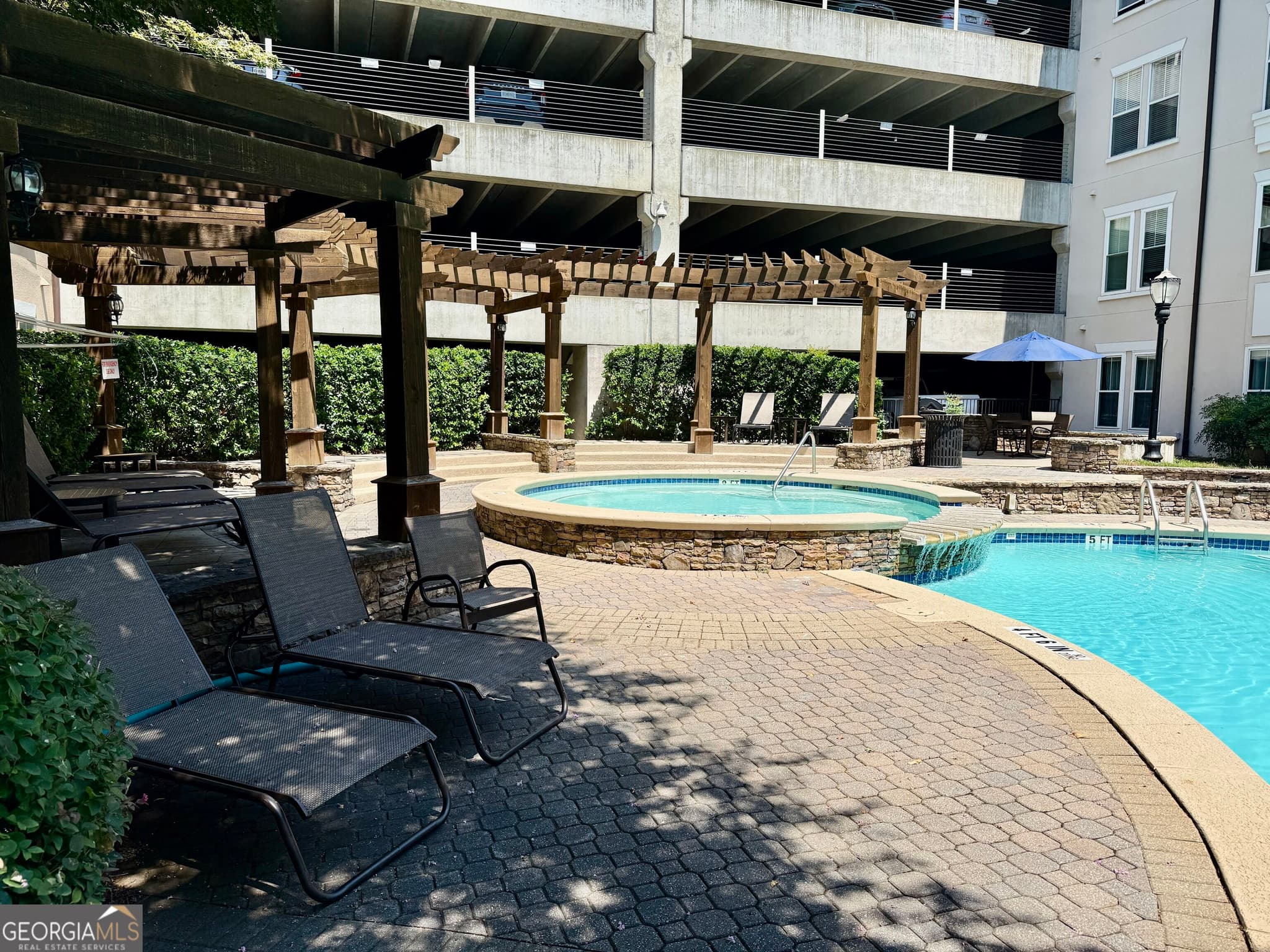 2 bedroom, 2 bathroom, 1,168 sq ft condominium for sale at 1850 Cotillion Drive, Atlanta, GA 30338 — photo 1 of 72