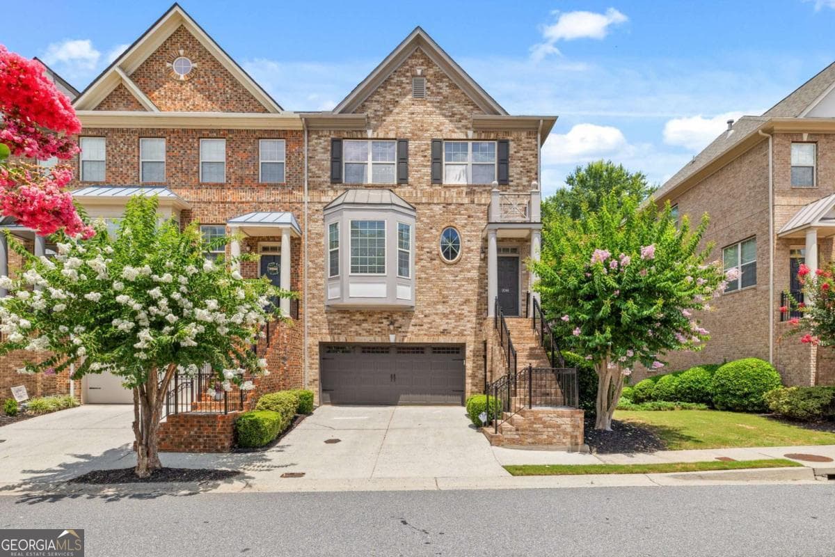 4 bedroom, 4 bathroom, 3,200 sq ft townhouse sold at 9044 Woodland Trail 41, Alpharetta, GA 30009