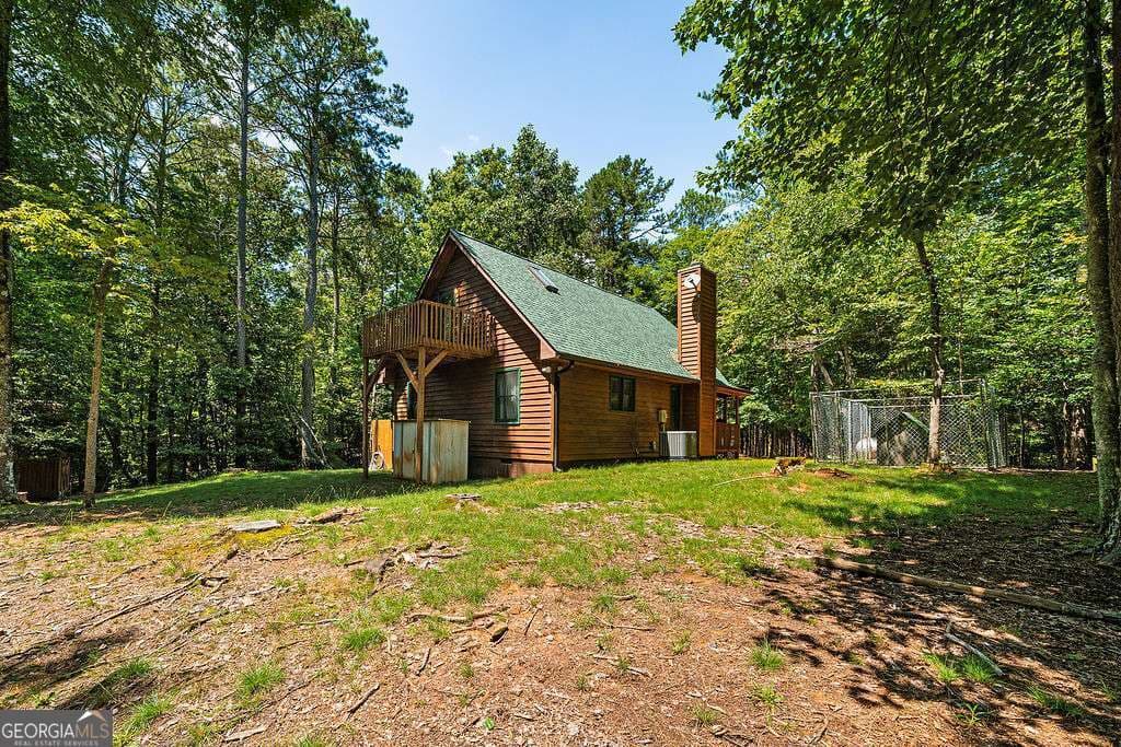 2 bedroom, 1.5 bathroom, 1,176 sq ft cabin,single family residence for sale at 1247 Newport Drive, Ellijay, GA 30540 — photo 8