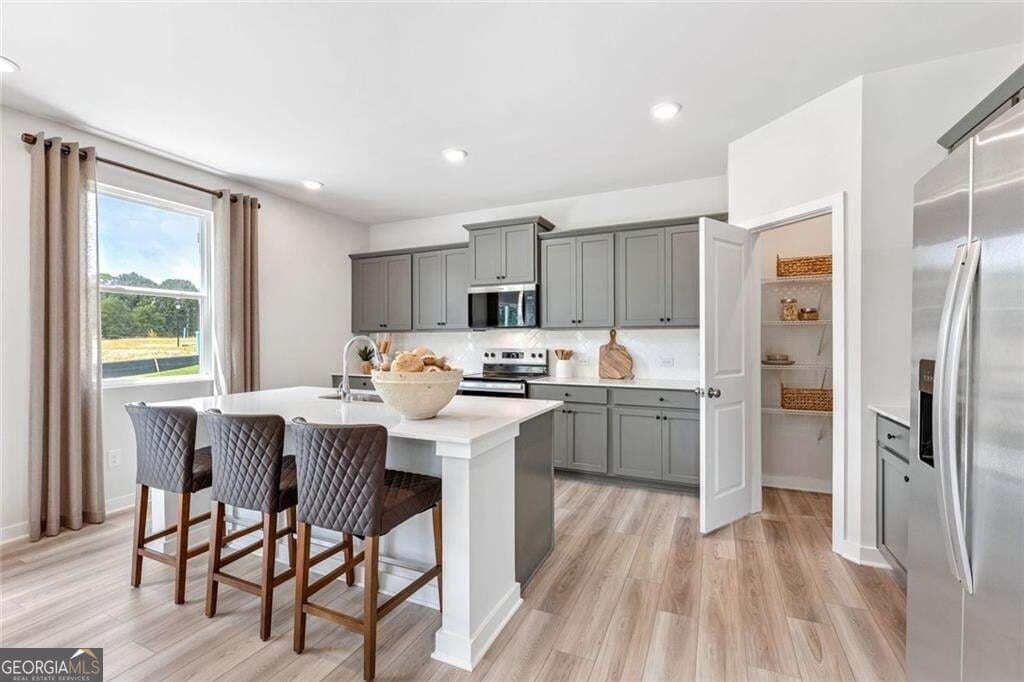 5 bedroom, 4 bathroom, 2,774 sq ft single family residence for sale at 8043 Joyce Way, Fairburn, GA 30213 — photo 8