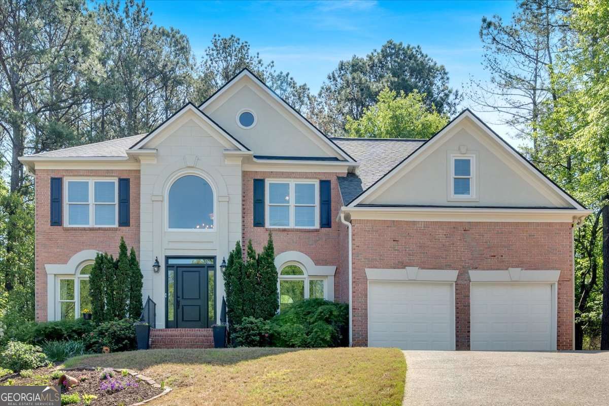 6 bedroom, 3.5 bathroom, 3,916 sq ft single family residence sold at 402 Bridgepoint Lane, Woodstock, GA 30189