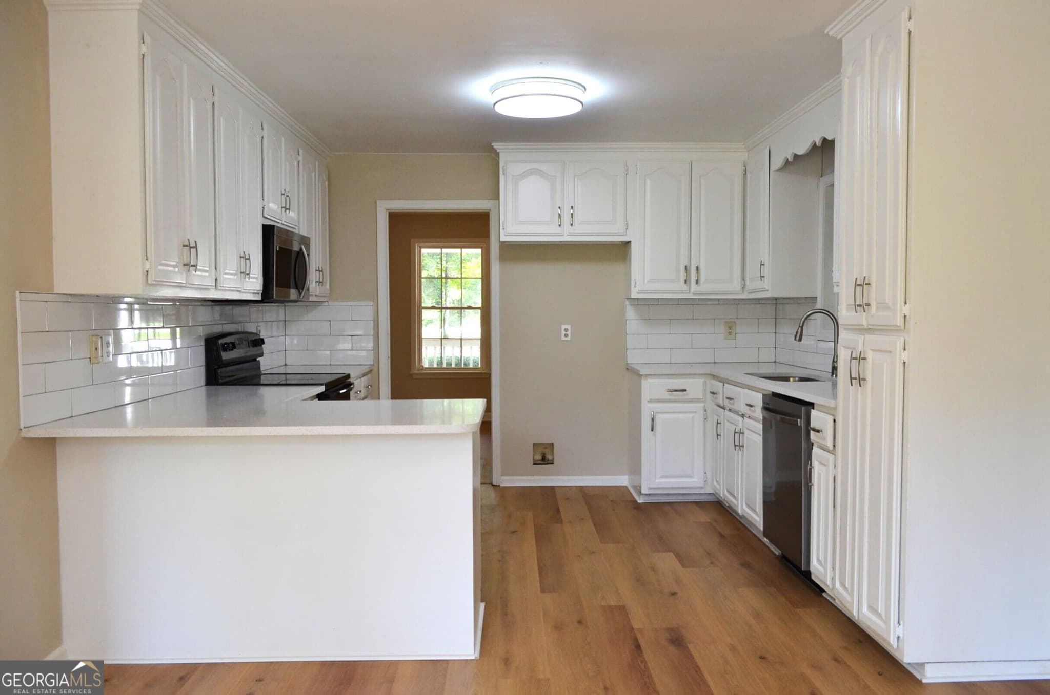 5 bedroom, 3.5 bathroom, 3,430 sq ft single family residence for sale at 11374 Highway 74, Forsyth, GA 31029 — photo 7