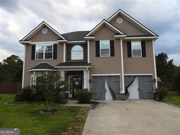 4 bedroom, 2.5 bathroom, 2,787 sq ft single family residence for sale at 126 Owens Street, Ludowici, GA 31316 — photo 2