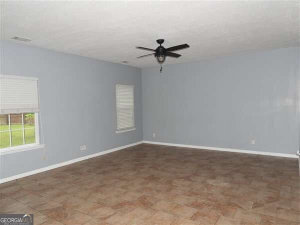 4 bedroom, 2.5 bathroom, 2,787 sq ft single family residence for sale at 126 Owens Street, Ludowici, GA 31316 — photo 4