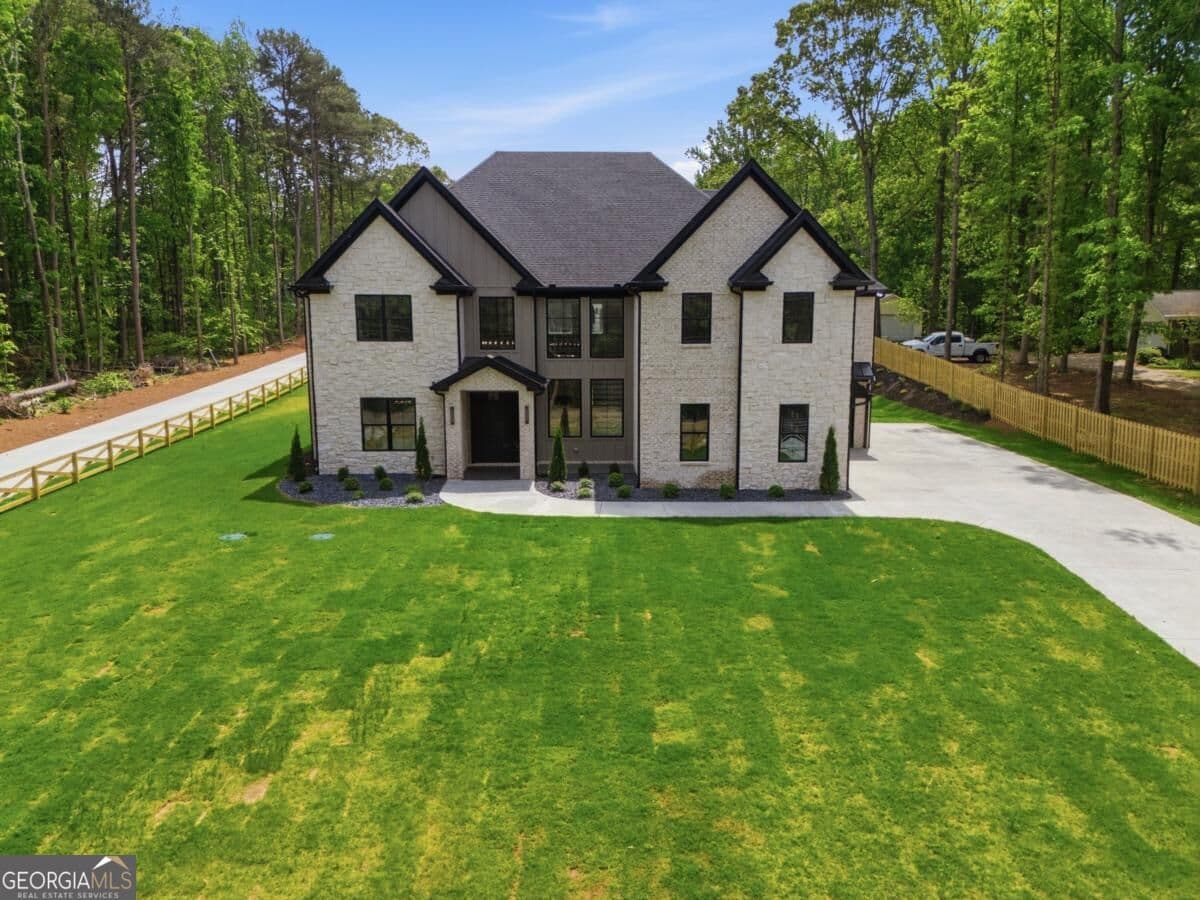 5 bedroom, 5.5 bathroom, 5,500 sq ft single family residence for sale at 2196 Old Fountain Road, Lawrenceville, GA 30043 — photo 6