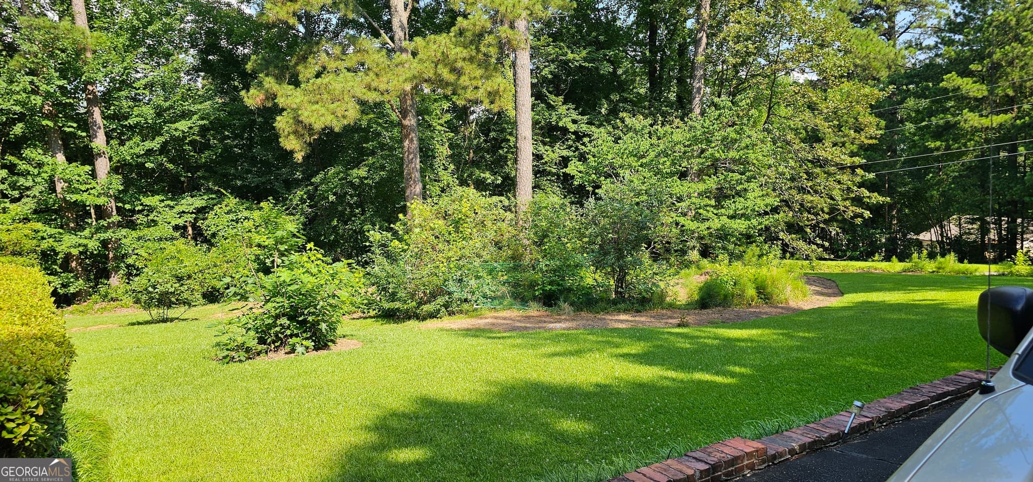 3 bedroom, 1.5 bathroom, 1,475 sq ft single family residence for sale at 1870 Groover Road, Marietta, GA 30062 — photo 2