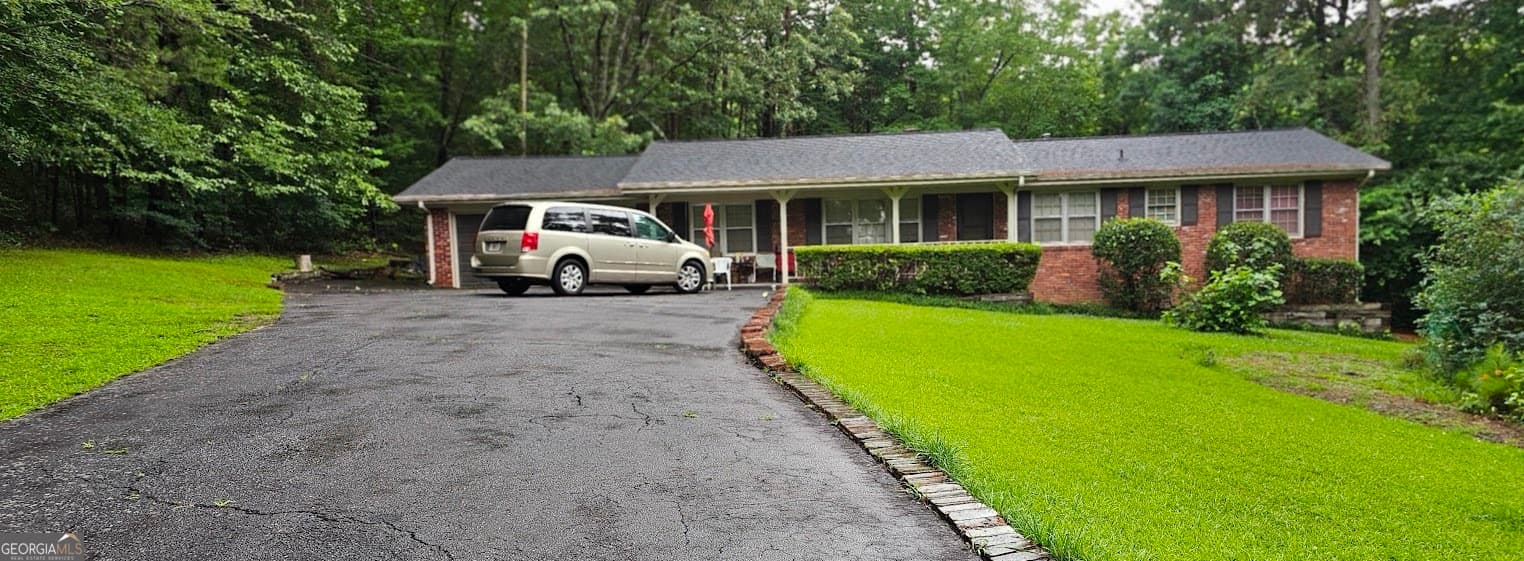 3 bedroom, 1.5 bathroom, 1,475 sq ft single family residence for sale at 1870 Groover Road, Marietta, GA 30062 — photo 3