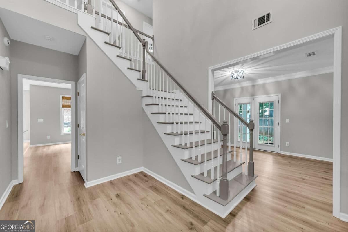 5 bedroom, 3 bathroom, 3,187 sq ft single family residence for sale at 2373 Oak Falls Lane, Buford, GA 30519 — photo 8