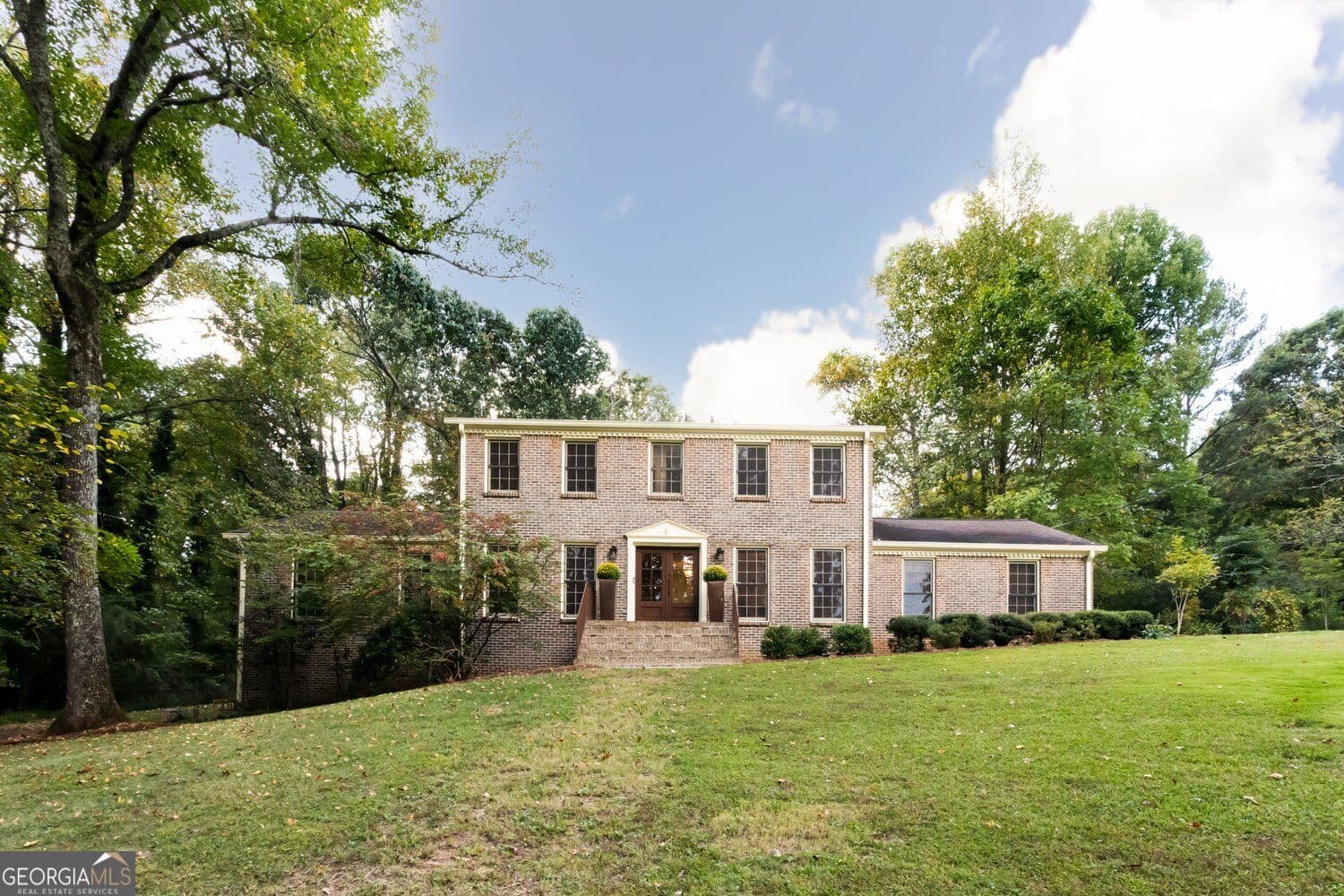 5 bedroom, 4 bathroom, 5,324 sq ft single family residence for sale at 2119 Gunstock Drive, Stone Mountain, GA 30087 — photo 2