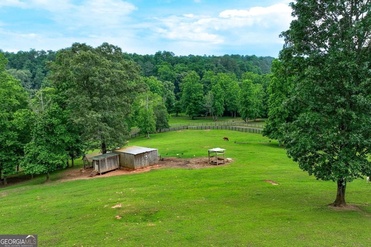 5 bedroom, 3.5 bathroom, 5,810 sq ft single family residence for sale at 7945 Reinhardt College Parkway, Waleska, GA 30183 — photo 6