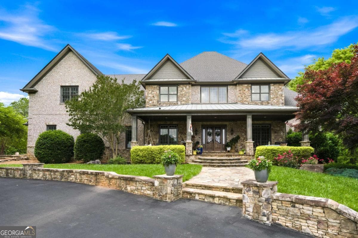 5 bedroom, 3.5 bathroom, 5,810 sq ft single family residence for sale at 7945 Reinhardt College Parkway, Waleska, GA 30183 — photo 9