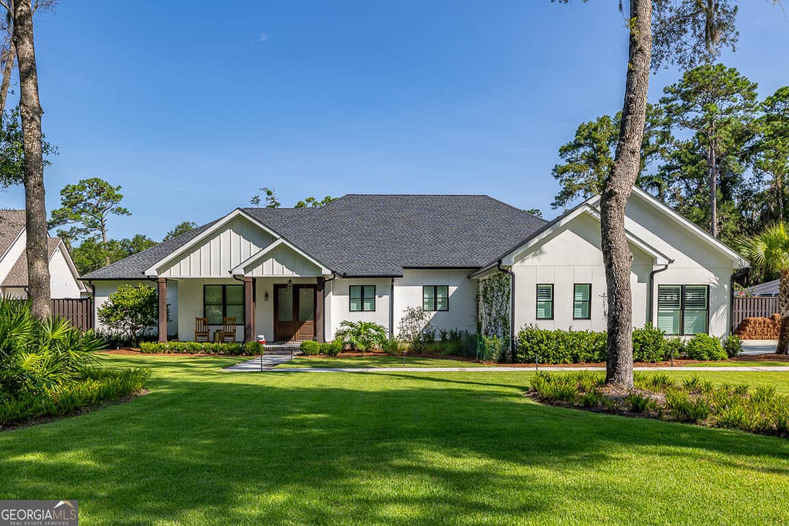 4 bedroom, 3.5 bathroom, 3,453 sq ft single family residence for sale at 147 Butler Lake Drive, St. Simons, GA 31522 — photo 2