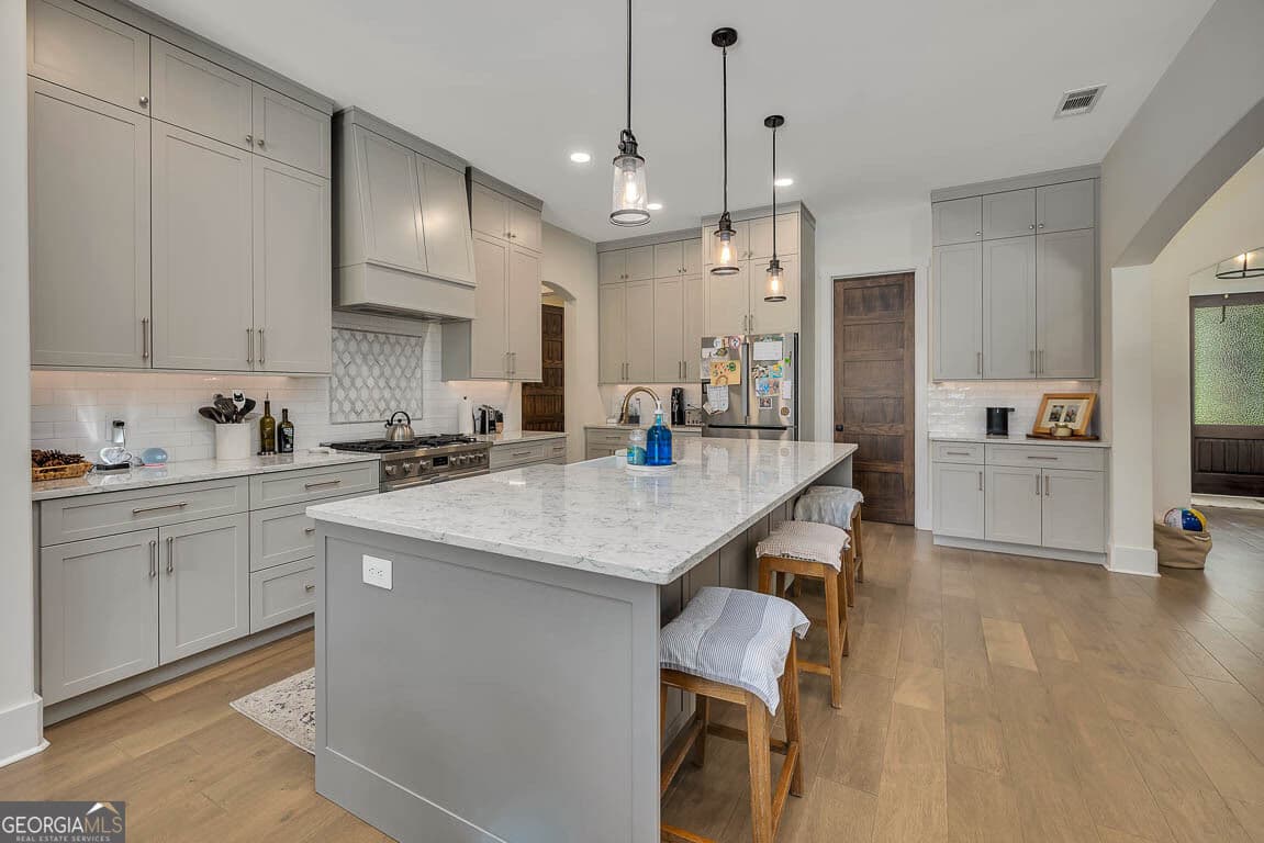4 bedroom, 3.5 bathroom, 3,453 sq ft single family residence for sale at 147 Butler Lake Drive, St. Simons, GA 31522 — photo 9